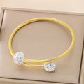 Timeless Elegance Cable Bangle – Gold Stainless Steel with Crystal Balls